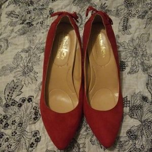Like new Coach and four Heels